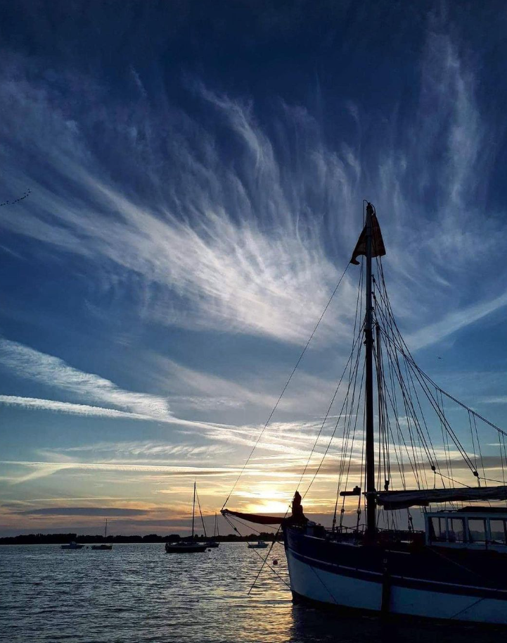 Bateau baie Regnéville-sur-Mer couché de soleil